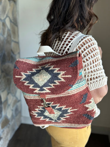 rust, brown, turquoise + tan aztec woven backpack