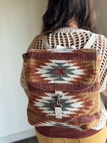brown, rust + teal aztec woven backpack