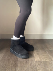 black fur-lined ultra mini platform boots