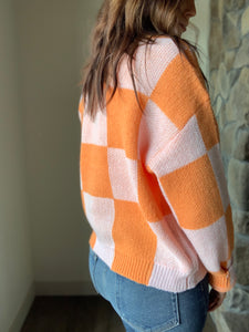 orange checkered cardigan