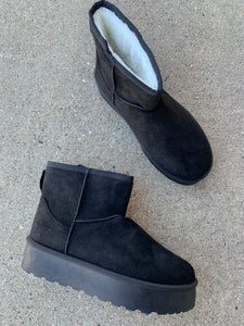 black fur-lined ultra mini platform boots