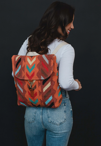 orange multi woven backpack