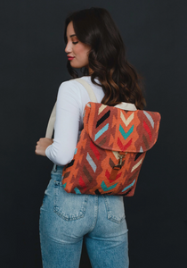 orange multi woven backpack