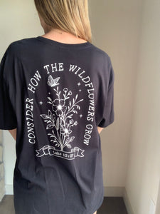 consider how the wildflowers grow oversized graphic tee